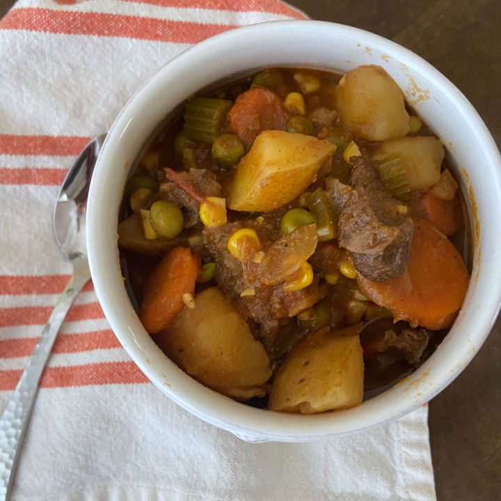 bowl of beef stew in a white bowl