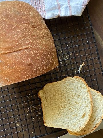 This bread is the easiest and best sourdough sandwich bread! Homemade, buttery and soft, you will never buy sandwich bread from the store again! Serve this bread for sandwiches or enjoy by itself with some butter and honey drizzled on top.