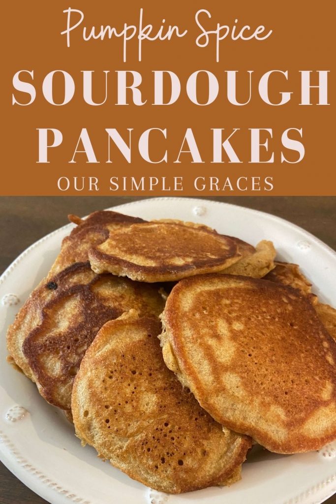 close up image of white plate of pumpkin spice sourdough pancakes with text above with title of recipe for our simple graces