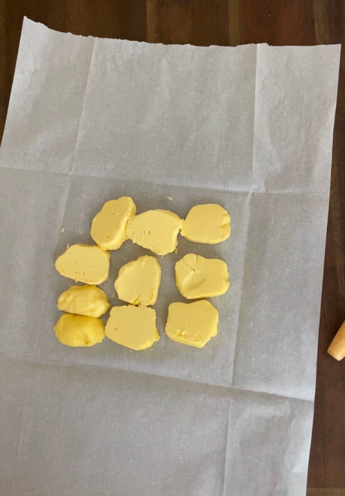sliced butter on parchment paper