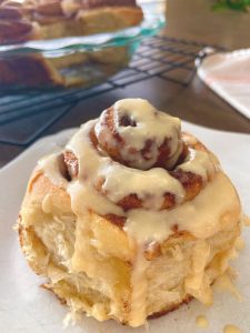 This Cinnamon Rolls Sourdough Starter recipe is the epitome of delish- with soft, buttery dough, ooey gooey filling and melty maple cream cheese glaze drizzled on top.