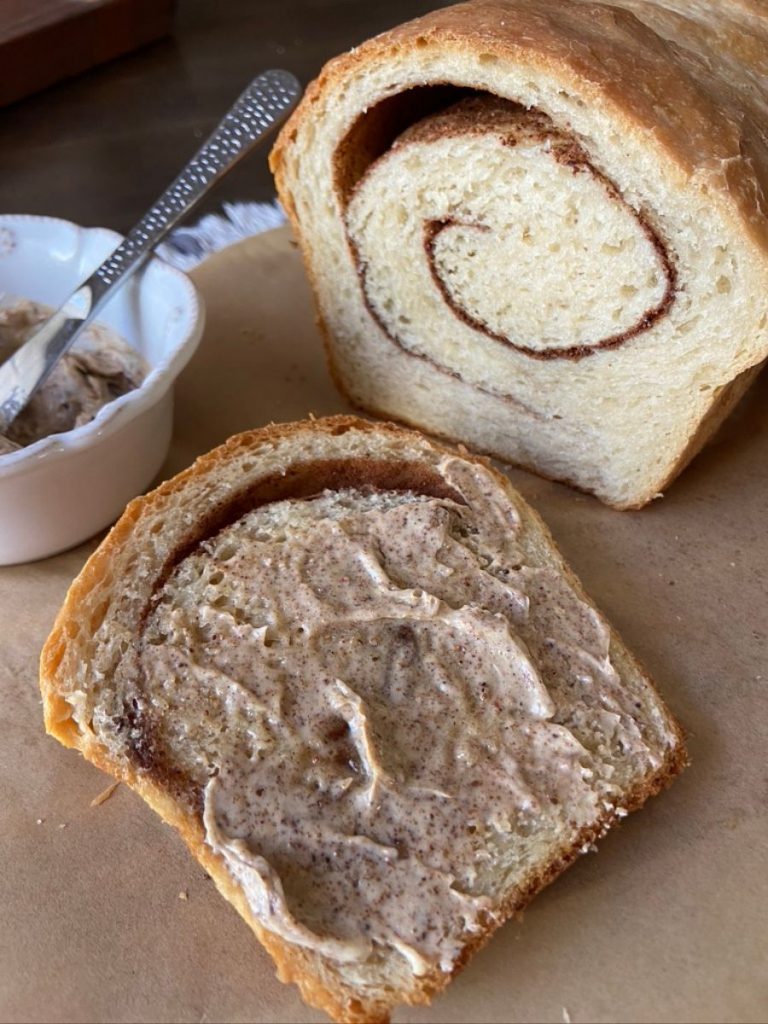 sourdough cinnamon bread sliced with cinnamon sugar butter