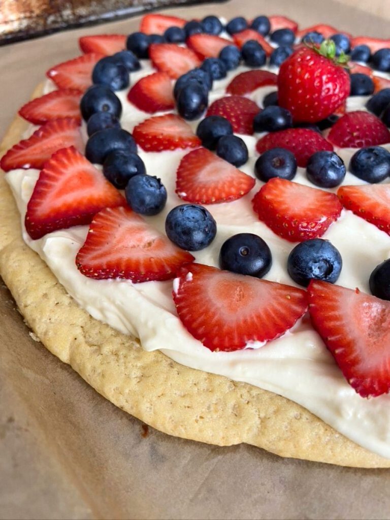 Sourdough fruit pizza with strawberries and blueberries
