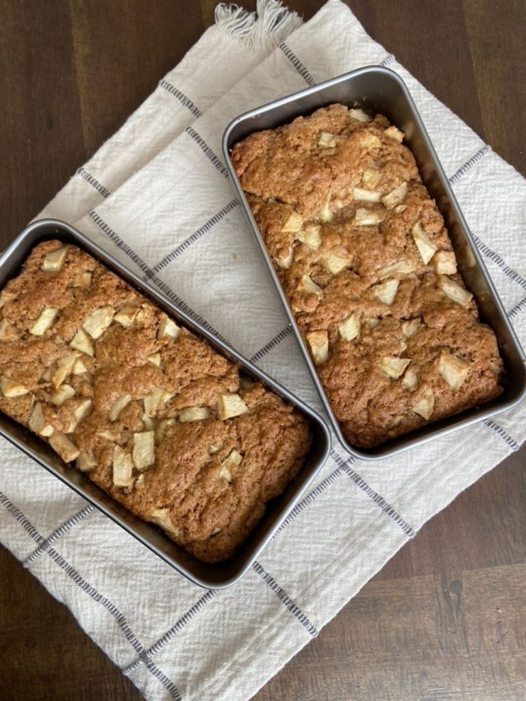 apple cake in loaf pans on tablecloth