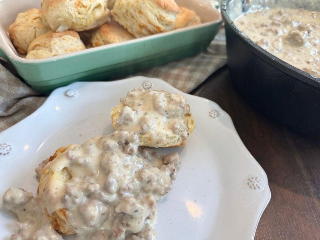 sourdough biscuits and sausage gravy on table